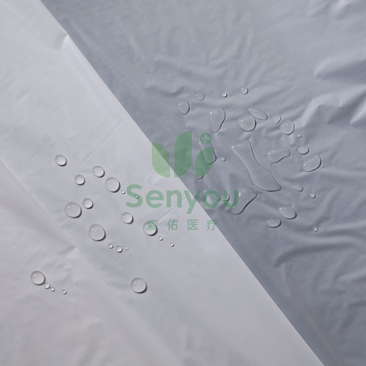 PE Film lamination PP Nonwoven Fabric Rolls supply for surgical back table cover/gowns